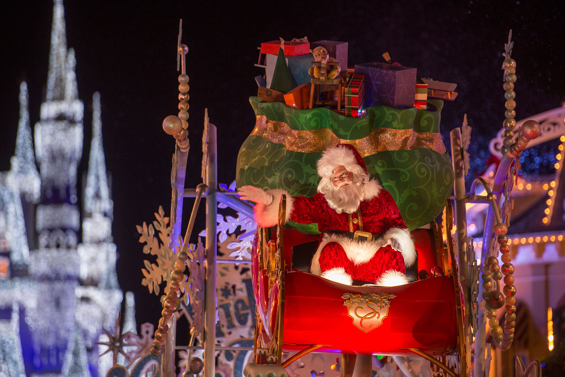 Santa in Holiday Parade at Mickey's Very Merry Christmas Party in Disney World; Courtesy of Disney's Very Merry Christmas Party in Disney World; Courtesy of Disney